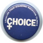 Button distributed by the Ontario Coalition for Abortion Clinics to show support for the legalization of free-standing abortion clinics.