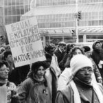 This placard at Toronto International Women's Day March calls for equal employment opportunities for native women.