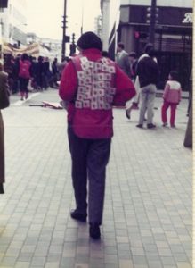 Onni Milne, Vancouver International Women's Day Committee member, walking in the IWD March in 1985.