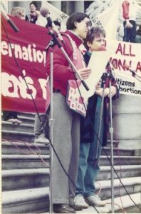 Libby Davies, City of Vancouver Councillor, and Onni Milne, Vancouver International Women's Day Committee member at the IWD Rally outside the Vancouver Art Gallery in 1985.