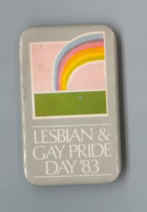 This button supports Lesbian and Gay Pride Day in 1983 in Toronto.