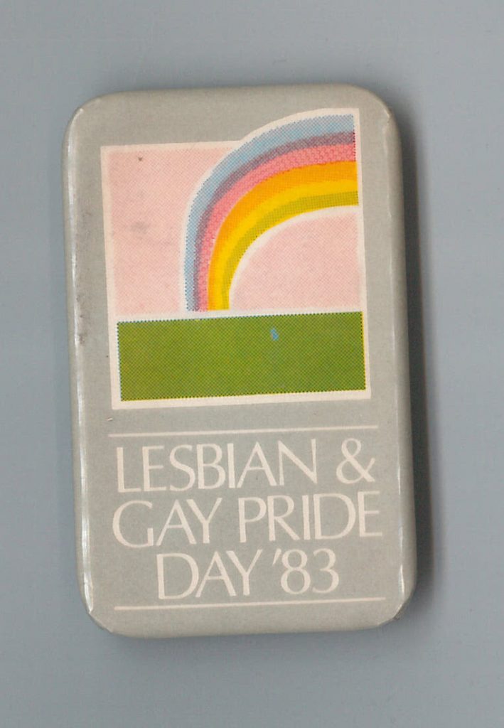 This button supports Lesbian and Gay Pride Day in 1983 in Toronto.