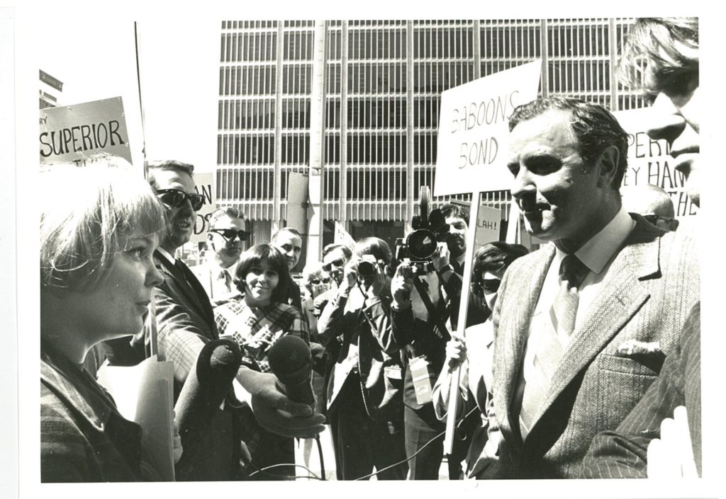 In this photo, protestors outside Maclean's magazine confront Alexander Ross over his article about Lionel Tiger's book Men in Groups in which Tiger theorizes about differences in male and female roles and male superiority.