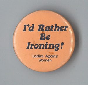 Humourous button by Ladies Against Women.