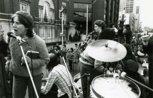 The Red Berets playing outside the US consulate in Toronto at the Against Cruise Testing (ACT) Demo on April 23, 1983.