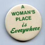 Button with slogan "A Woman's Place is Everywhere"