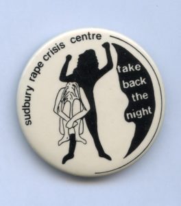 "Take Back the Night" Button created by the Sudbury Rape Crisis Centre in 1989.