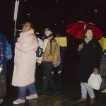 Carol Allain (in pink coat), member of the Black Women's Collective, is surrounded by others at protest against police violence. In response to the October 27, 1989, police shooting of 23-year-old Black woman Sophia Cook, the Black Women’s Collective organized the Women’s Coalition Against Racism and Police Violence. This coalition of 35 women’s and progressive organizations brought people together on December 16, 1989, to demand police accountability and an end to police brutality against Black people.