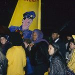 Leleti Tamu, member of the Black Women's Collective, is surrounded by others at the Sophia Cook protest. In response to the October 27, 1989 police shooting of 23-year-old Black woman Sophia Cook, the Black Women’s Collective organized the Women’s Coalition Against Racism and Police Violence. This coalition of 35 women’s and progressive organizations brought people together on December 16, 1989, to demand police accountability and an end to police brutality against Black people.