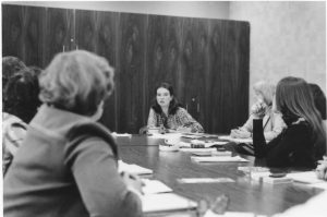 This is an undated photo showing an early Ontario Federation of Labour Women's Committee meeting. Shelley Acheson, Human Rights Director, is speaking.