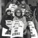 The union leadership of the Metro Library Strike organized fun days on the picket lines as a creative way to attract attention, win support and build pressure on the politicians responsible for running the library. Here members of CUPE Local 1582 watch the poets and singers on the arts and letters solidarity picket, acknowledging the work of the Music and Fine Arts departments. Front row left to right: M. Gordon, Susan Willis, Gerry Haley. Back row Bob Adams, Susan Reed