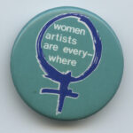A button drawing attention to women artists.
